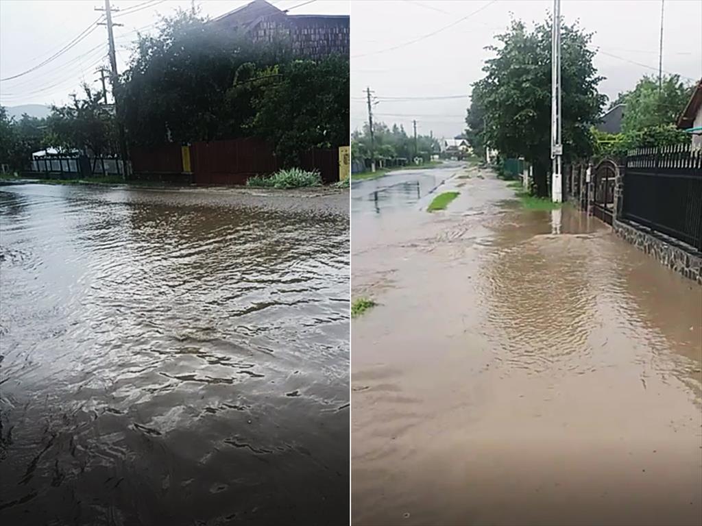 Din nou inundații la Bobolia (Poiana Câmpina). Apa de pe versanți a ajuns pe drum și în curțile oamenilor